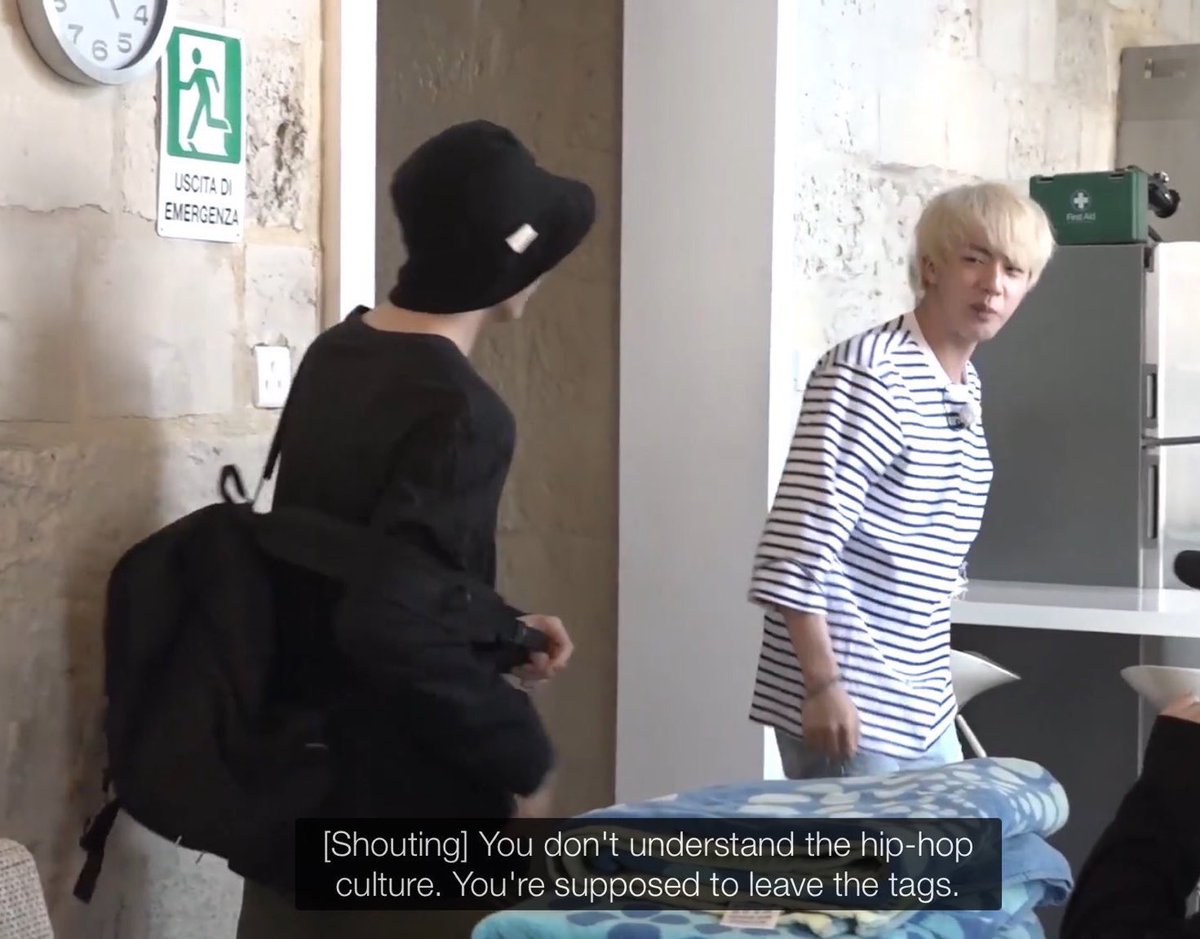 Which brings us to TAGS. Lets be honest, when we saw Jin leaving his tags on, most of us did not really understand his def of “hip hop culture” including BTS. JK fought with him to forcefully take it off. But since its Jin & he even found a shoe brand that leaves tags on!!!!!