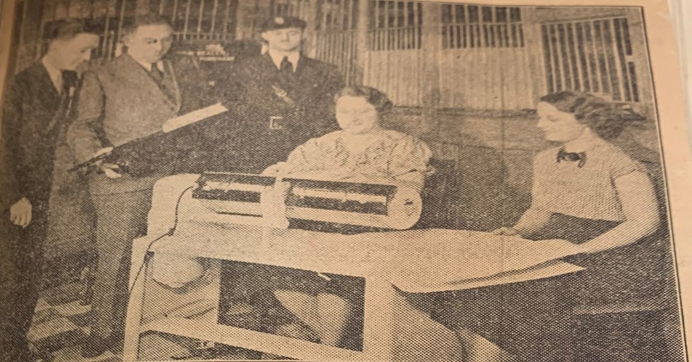 Employees use Westinghouse irons to dry currency, wills and other valuable documents  inside customer safe deposit boxes. 