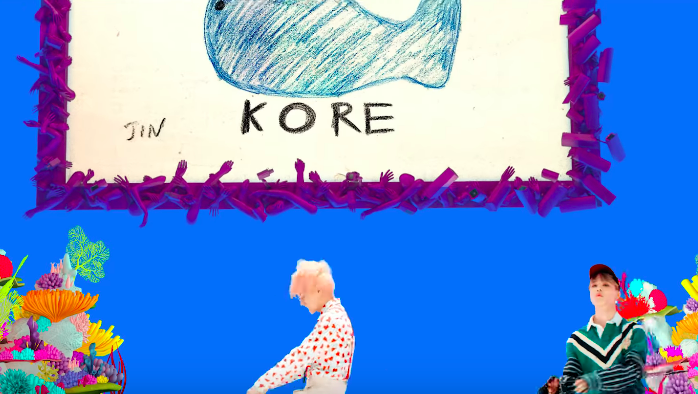 Kore, made on a "whim", one amongst many pics for the Idol MV. But thanks to Jin's constant references and adoption of Thom Browne’s Kore sweater(remember how he found the shoe brand with tags), now its synonymous enough with Jin to be casually referenced on RUN BTS