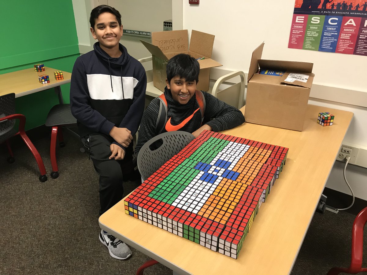 OverlakeSchool's tweet photo. Our library has hundreds of Rubik's cubes for our newest club, and students are creating some visual designs with them. Can you guess this one? https://t.co/JCwhmHjW76