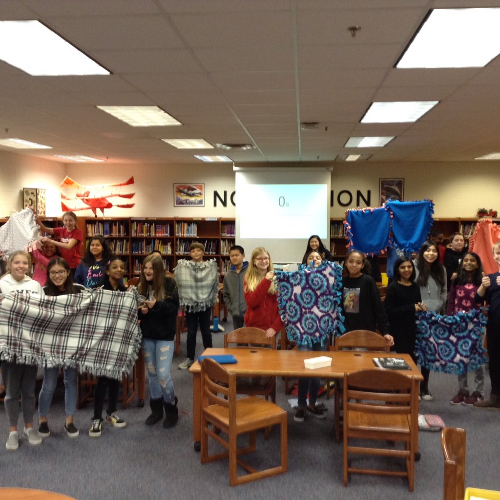 RBMS_PE's tweet photo. 7th grade Ss showing off their finished blankets as part of a Compassion Project.  They are on their way to Australia, Texas, S. Carolina, and Virginia @RBMS_Official @awheeler_wheels @LCPSHPE https://t.co/BzU7nXyPwh