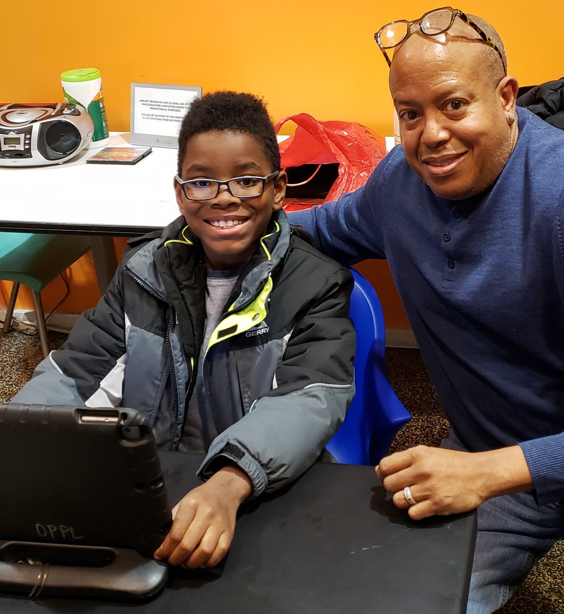 D97 students trying Lightbot at Code Fest 
hosted by the Oak Park Library