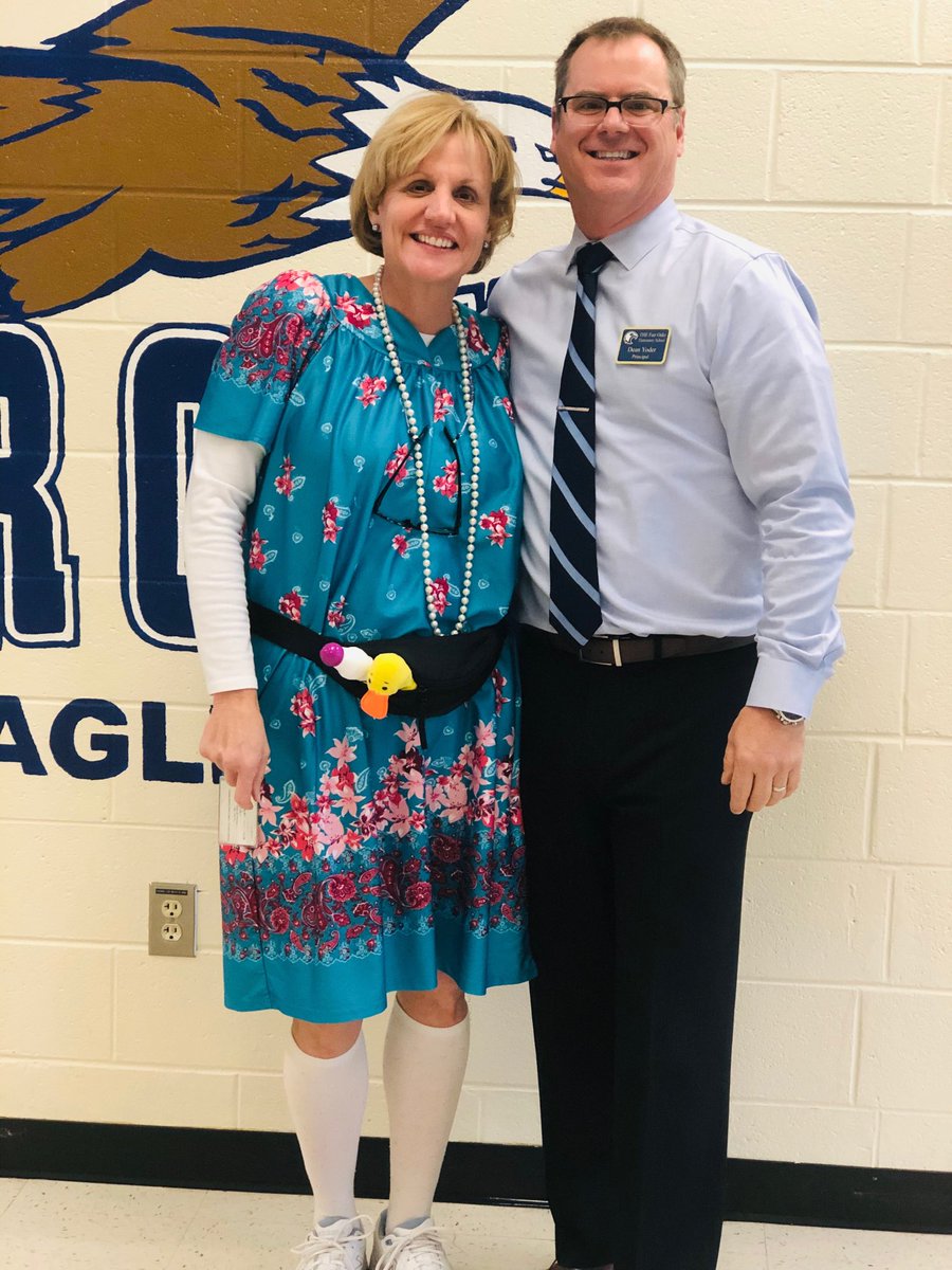 DeanYoder3's tweet photo. Today’s Thursday dress down theme at THE Oaks was to dress like my grandmother on Bingo Night! Mrs. Wagley won hands down. Her prize is lunch for two, off-campus. I know my grandmother is looking down and smiling.⁦ ⁦@CobbSchools⁩ ⁦@FairOaksEagles⁩ https://t.co/U472mc7oGR