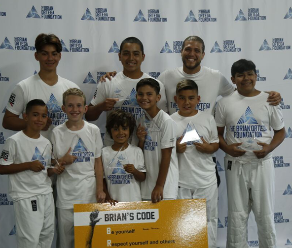 brianortegafdn's tweet photo. #TBT when @BrianTcity presented eight students with scholarships to the @GracieJJMadison Headquarters for Jiu-Jitsu training lessons. https://t.co/jiEwvsYt1P