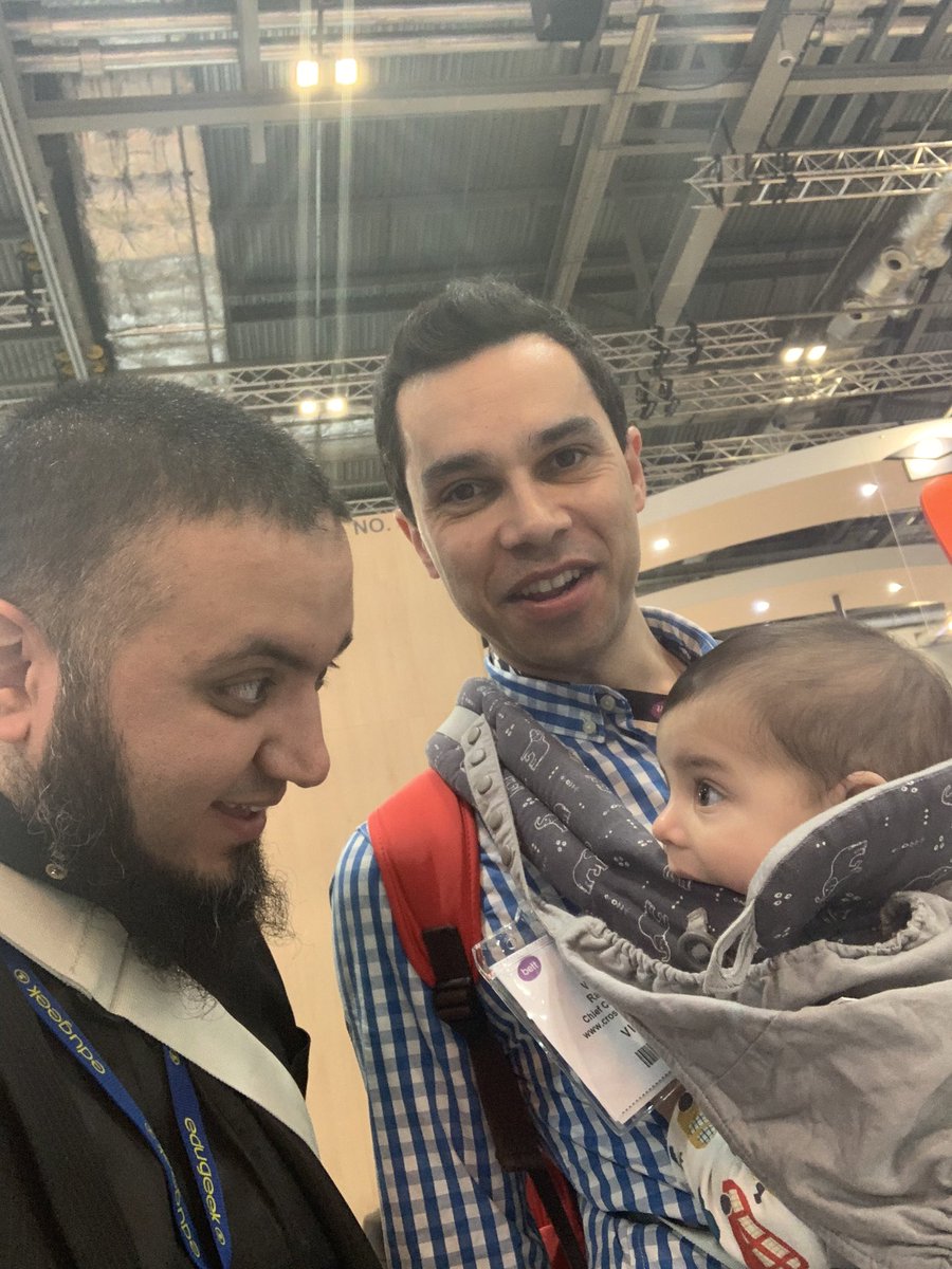 abid_patel's tweet photo. Absolutely wonderful to finally meet @CatLamin's beautiful boy William! He's the "Chief Cuddle Officer" of https://t.co/lTNjpPn629! Great to meet @sramdeen82 too! Always nice to see great IT pros doing great work in schools to enrich pupil lives! #EdTechTeam #Bett2020 @Bett_show https://t.co/Z3LLbuh9GI