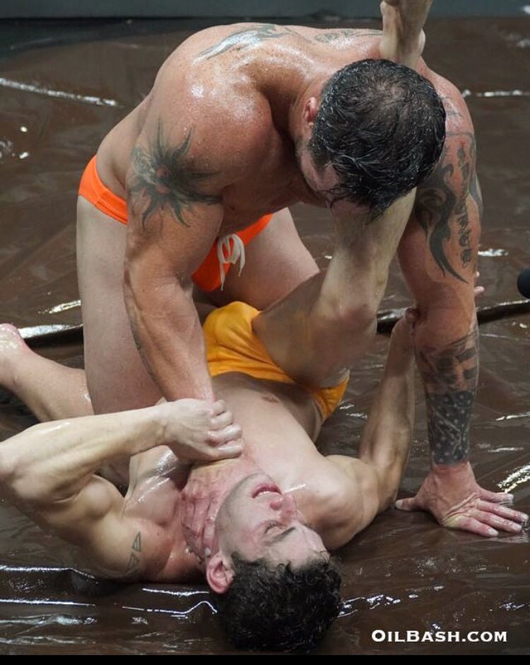 Oilbash1's tweet photo. Joey Nux takes @JohnWolfBoy1 to his limits. Hard to make a tough opponent tap...especially when he’s covered in baby oil #amateurwrestling #physique #cradle #mensswimwear #homoerotic https://t.co/tffPQ4ETED