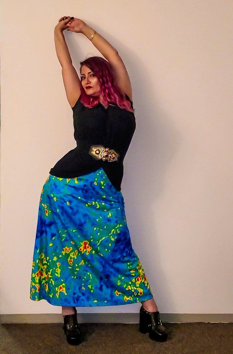 A pic of me in a skirt with the Cosmic Microwave Background printed on it