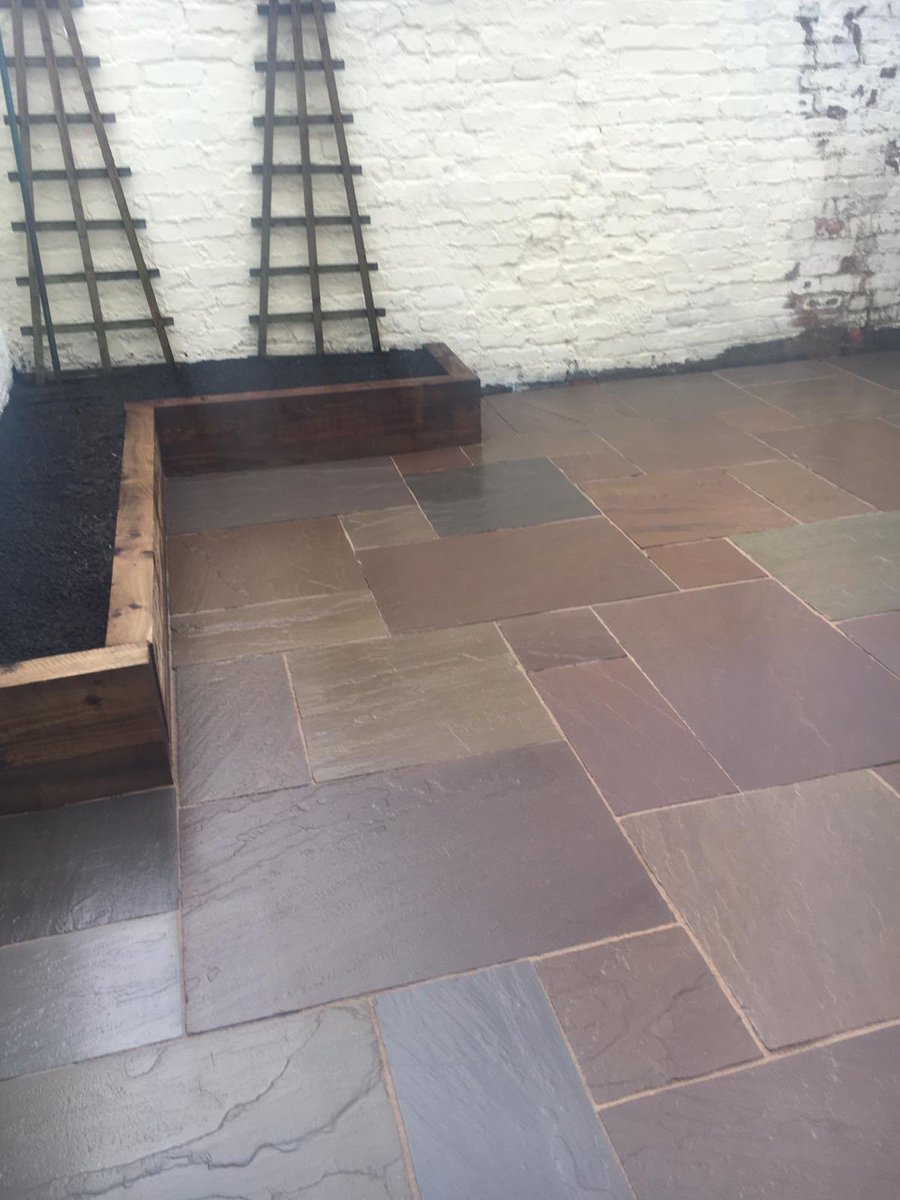 Andy_Fowler's tweet photo. Patio in Waterloo completed last year, Indian stone with geo-fix pointing,double raised sleeper beds for planting 😎👌🏻 #FowlersGardens #Landscaping #Liverpool https://t.co/bc7wr20LFe