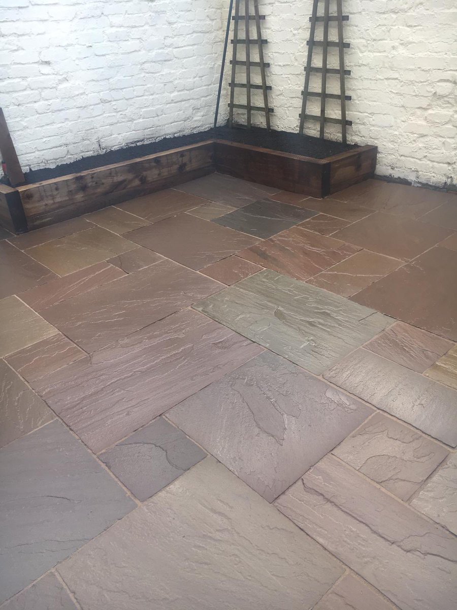Andy_Fowler's tweet photo. Patio in Waterloo completed last year, Indian stone with geo-fix pointing,double raised sleeper beds for planting 😎👌🏻 #FowlersGardens #Landscaping #Liverpool https://t.co/bc7wr20LFe