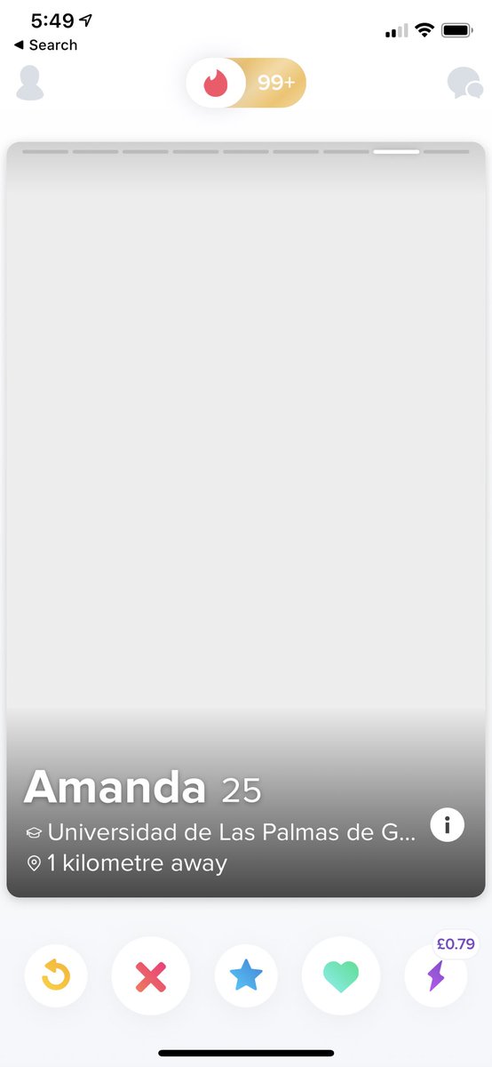 Screenshot from the Tinder app on iOS showing the default screen with an at-top navigation style.