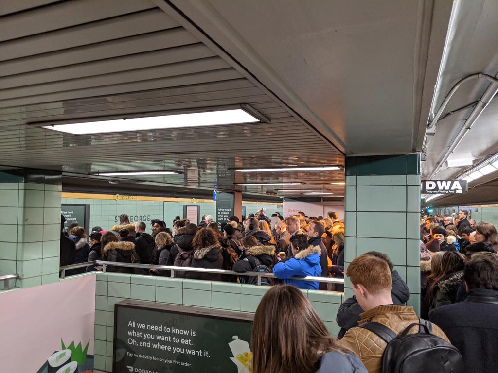 Frosty3D's tweet photo. "you may experience a delay on Line 1"
Here's a tip for the #TTC, if the platform is literally full of people along with the staircases, there isn't the possibility of delay.
Also, why are there no people managing this insanity?  Very unsafe. https://t.co/OTeHq3CsUI