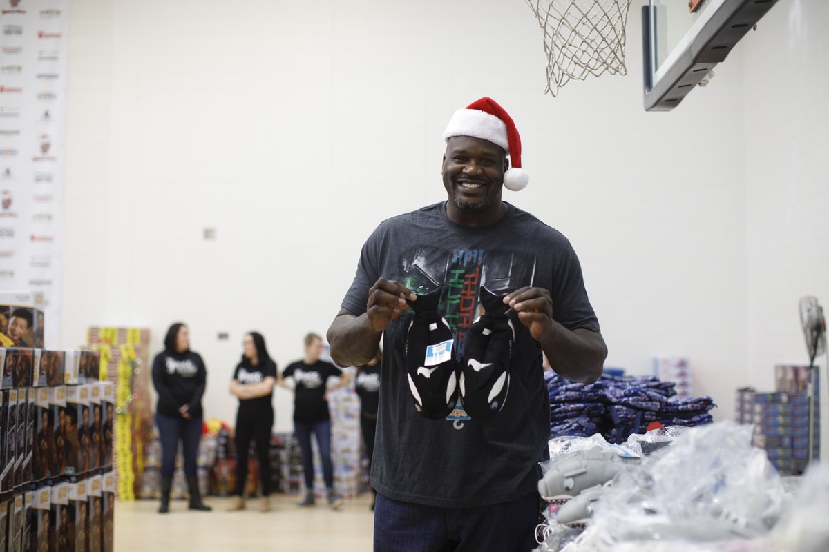 Shaq handing out FishFlops by Madison Nicole to bring a little more joy to the children at Wesley Lakes Elementary School.  When the community comes together everybody wins. #Teachers #Shaq #MadisonNicoleFishFlops #MadisonNicole  ©Jayde &amp; Jayne Photography