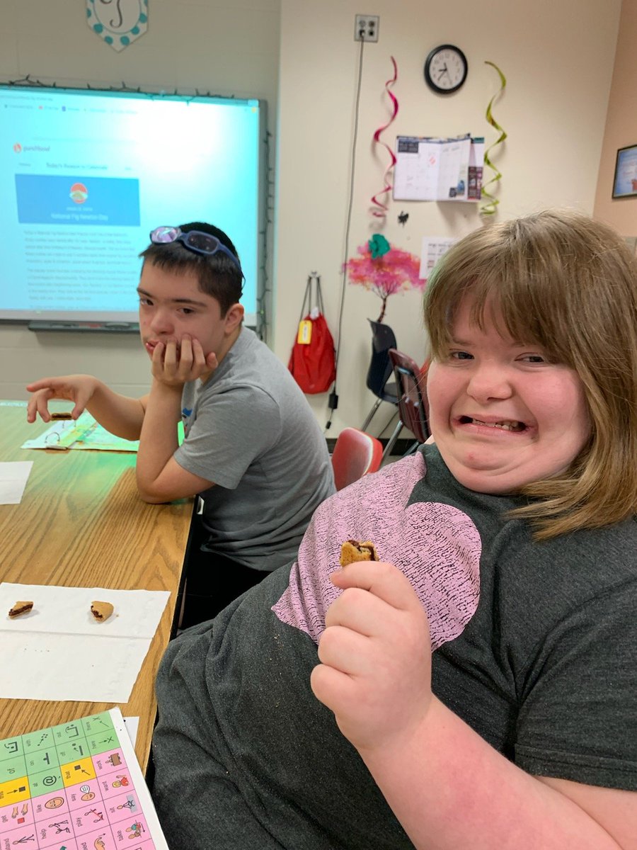 TJHS_Tara's tweet photo. Using speech boards to describe Fig Newtons on National Fig Newton Day! Getting Figgy with it! Bet you can't tell who doesn't like fig newtons! https://t.co/qF4UeIy2J4