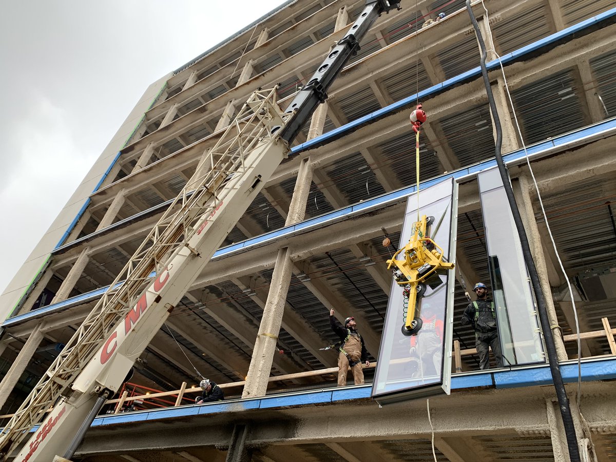 KSSarchitects's tweet photo. Installation of colored glass is underway at @Penn's  Tangen Hall! Once complete, the glass will form a playful, vibrant color gradient that will act as an emblem of the vibrant &amp; dynamic nature of the building’s interior. https://t.co/H2rUos6EEB