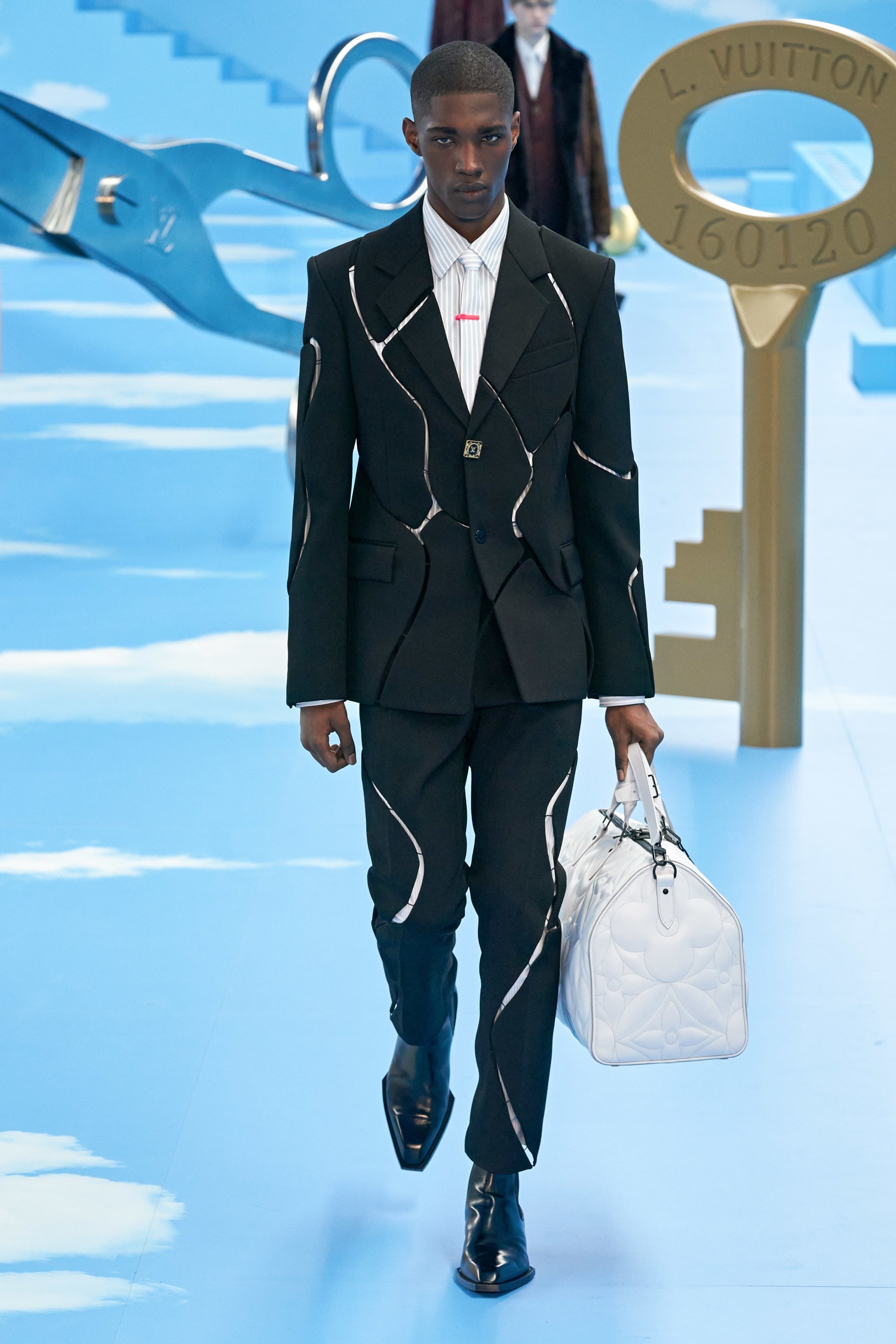 Street Night Live on X: The latest Louis Vuitton Fall 2020 showing had  reference to The Truman Show and some very interesting takes on the modern  suit. If there's one thing Virgil