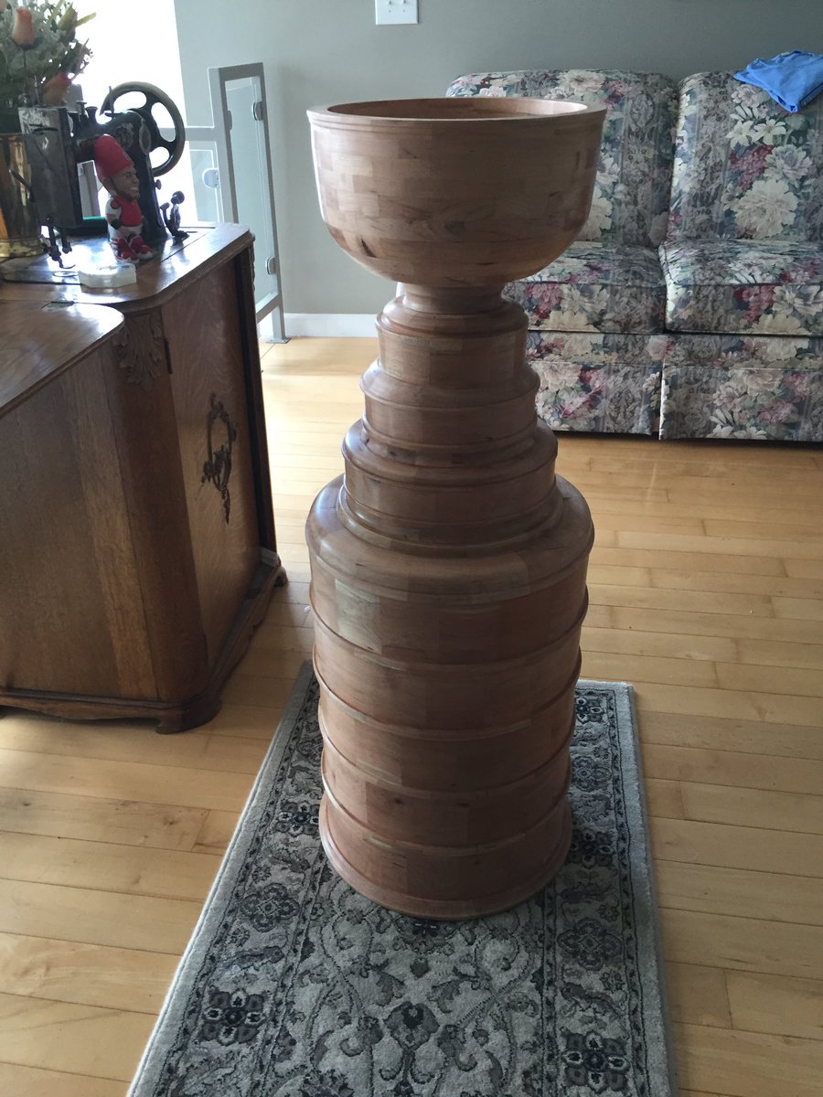 TimPerr58896046's tweet photo. This is my Father in Law, Sam. He made this Stanley Cup for me for my birthday out of wood from a downed cherry tree. The man has skills. Looks even more impressive in person! Thx Sam! @StLouisBlues @stlcuptracker @KSHEGUY @lernvsradio @101espn @NHL @_carltheintern @Patrico1057 https://t.co/t9CSOWXy7J