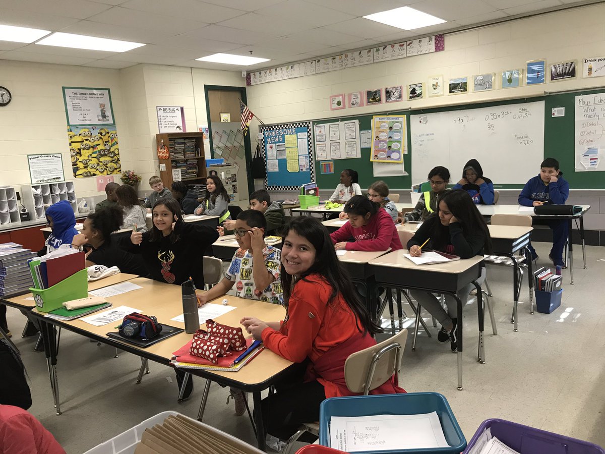 Jwolfe5BCPS's tweet photo. This is one of the coolest things ever. A student bought “teach a lesson to the class” with her tickets. She is teaching a division lesson and the kids are totally into it. (I’m stepping in where necessary but she’s got this!) @BaltCoPS @saudlin1 @timbergroveES @TimberGroveAP https://t.co/49zCdSu23z