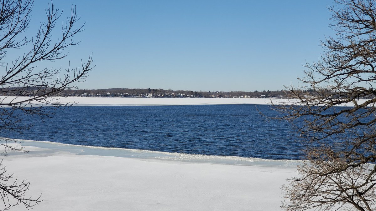 WissaintSt's tweet photo. As shared by @CleanLakes today, @LakeMendota is officially frozen over. It looks like Lake Waubesa didn't get the memo that it's time to freeze. The open water is a beautiful blue today! 
https://t.co/Sit0QKMf2T https://t.co/DKLnQuBpX4