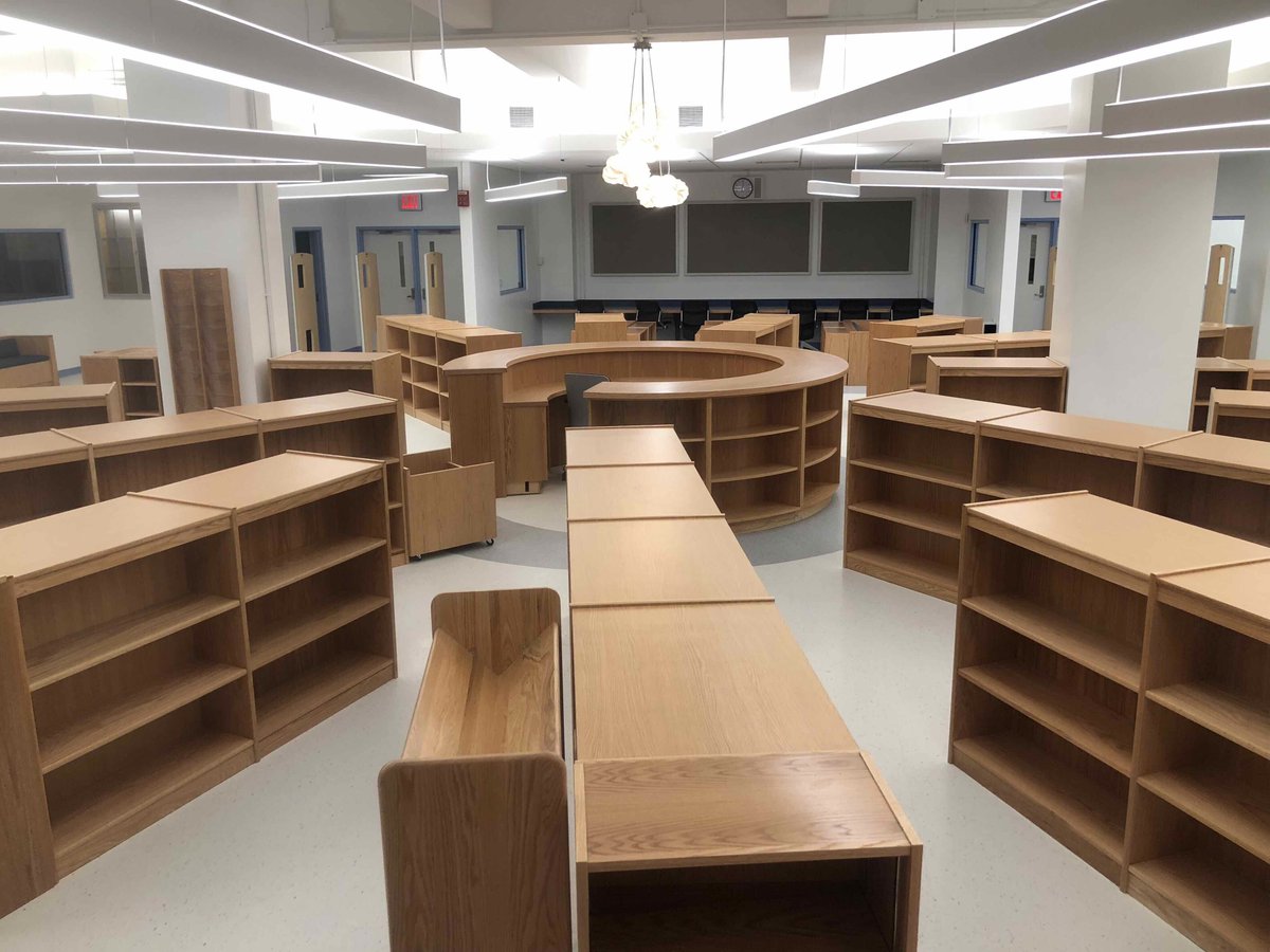 LitehouseBuild's tweet photo. #TBT to our Library Renovation at August Martin HS in Queens a couple of years ago. The project was completed within a few months and included new furniture, lights, increased ventilation and separate reading areas for students use! 📖 https://t.co/l26mvcHuvp