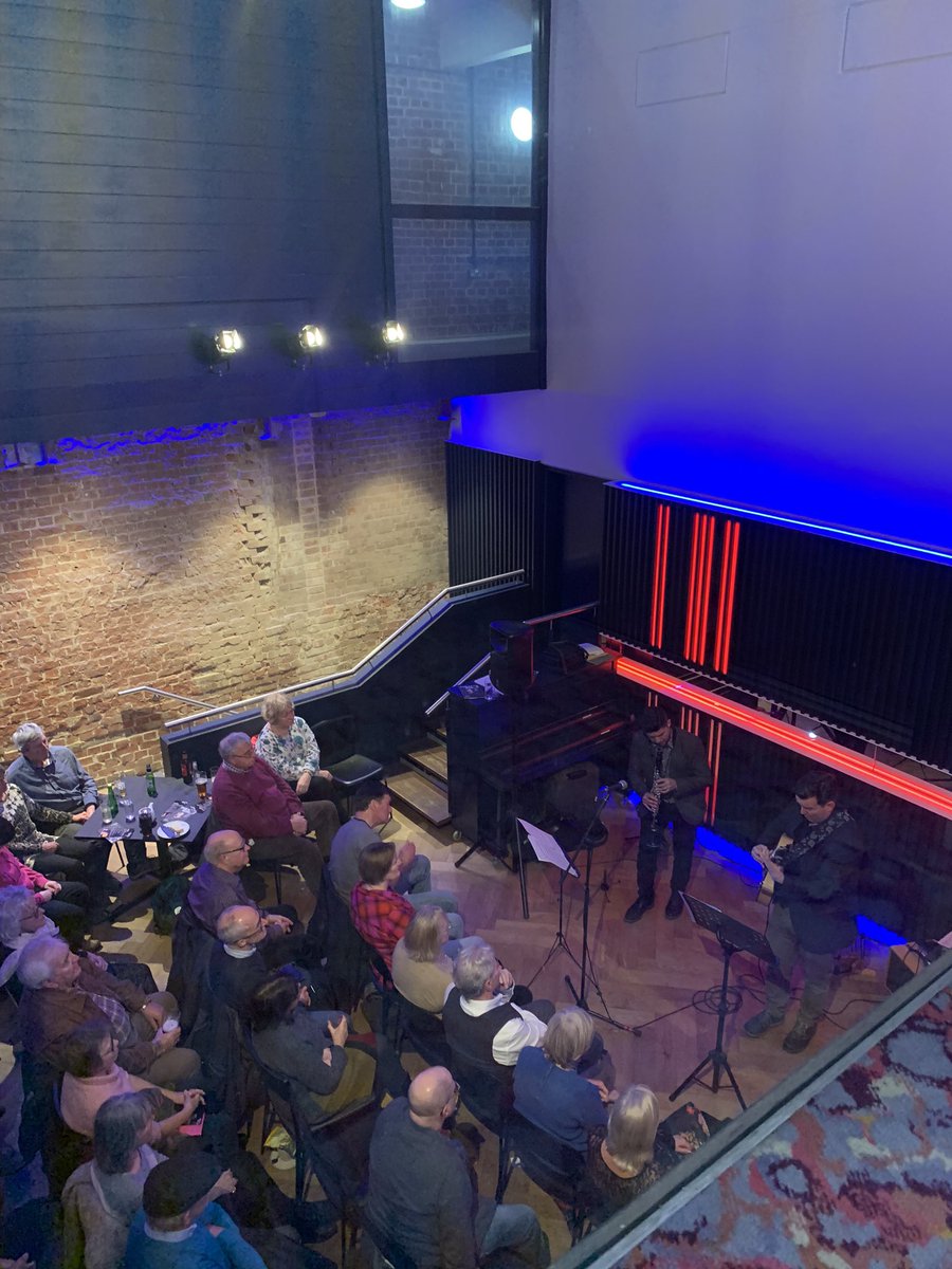 TRwinchester's tweet photo. The audience are loving the clarinet and guitar duo Jon Shenoy and Sam Dunn on our first Cafe Bar Jazz Night! Presented in conjunction with @WinchJazzFest #jazz #whatson #winchester  https://t.co/idQlhlWgdw https://t.co/cwTXf8p9Sd