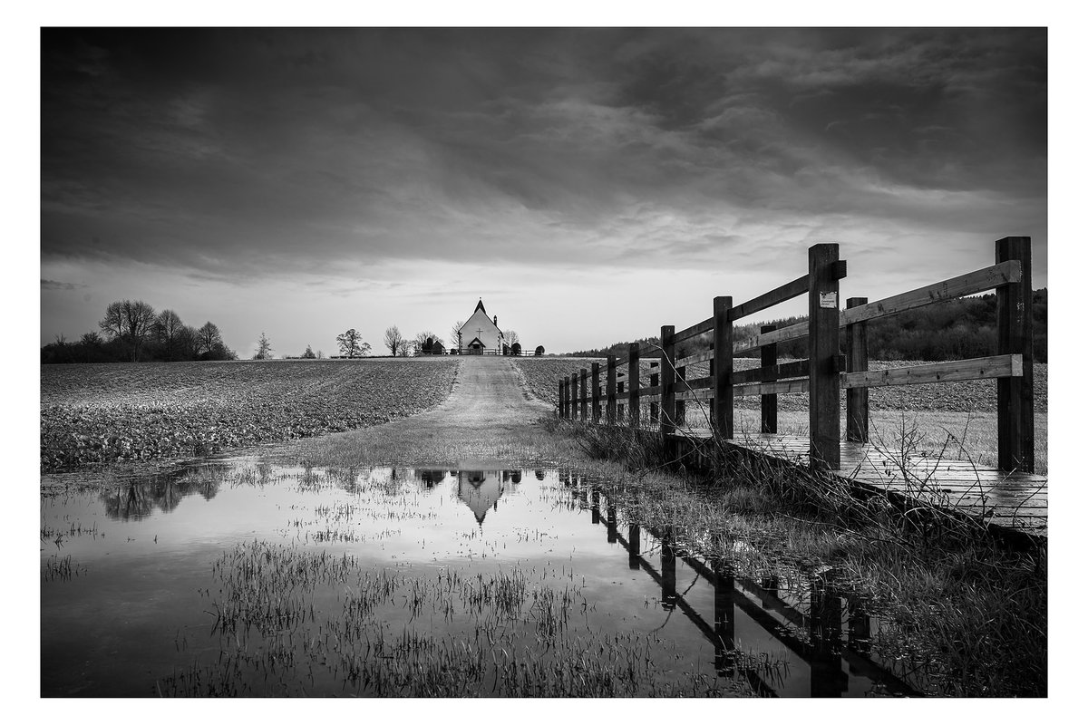 Hantsprints's tweet photo. A very soggy #hampshire at the moment, thank god for weather sealing, St Huberts Chapel #idsworth #landscapephotography #blackandwhitephotography https://t.co/EOLhShuyOo