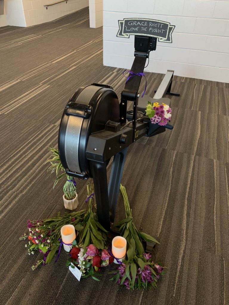 agreenphotog's tweet photo. A memorial to Holy Cross student athlete Grace Rett has begun to grow near this rowing machine in the athletic center @tgsports @telegramdotcom @holy_cross @GoHolyCross https://t.co/ORESnf8Eup