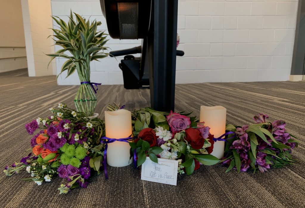 agreenphotog's tweet photo. A memorial to Holy Cross student athlete Grace Rett has begun to grow near this rowing machine in the athletic center @tgsports @telegramdotcom @holy_cross @GoHolyCross https://t.co/ORESnf8Eup