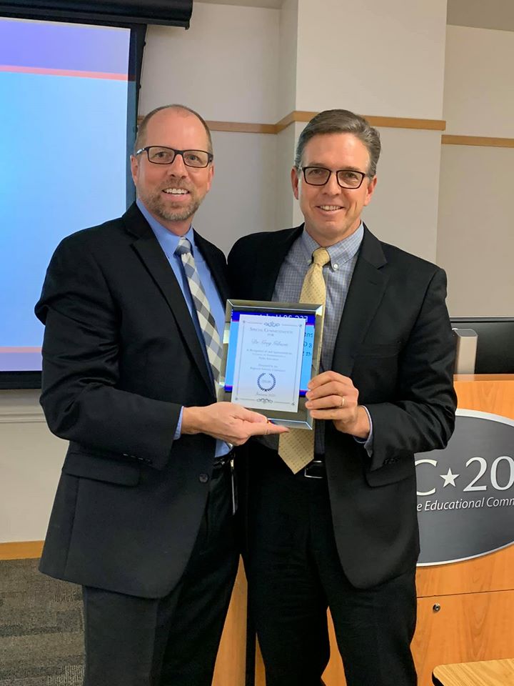 Education Service Center, Region 20 took a moment to recognize outgoing Superintendent Dr. Greg Gibson yesterday, presenting a plaque by Dr. Jeff Goldhorn, <a href="/ESCRegion20/">ESC Region 20</a> Exec. Director, thanking <a href="/GregGibson10/">Greg Gibson</a> for his ten years of service to SCUC ISD and 30+ years as an educator.