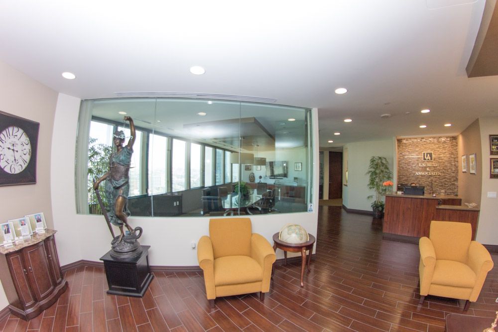 Wondering what to expect when meeting us for the first time? Here is a picture of our front office, where you will be greeted warmly by our staff and offered comfortable seat and something to drink while you wait.

Learn more at lauretilaw.com