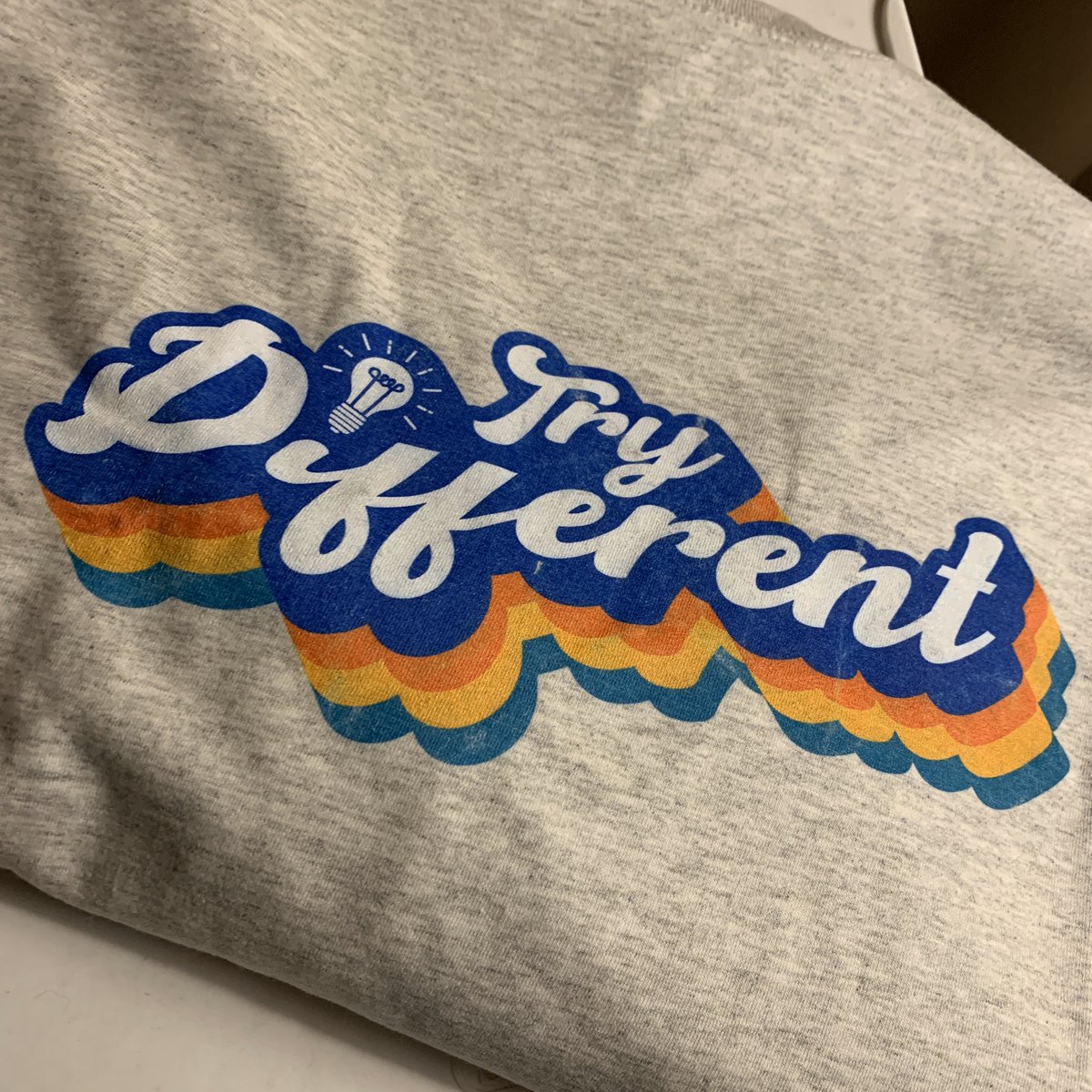 ADHDsurprise's tweet image. Excited to sport some newly purchased swag from the @HowtoADHD store, with a little reminder that if you're continuing to beat your head against the proverbial wall, it might be time to #TryDifferent #ADHD #neurodiversesquad