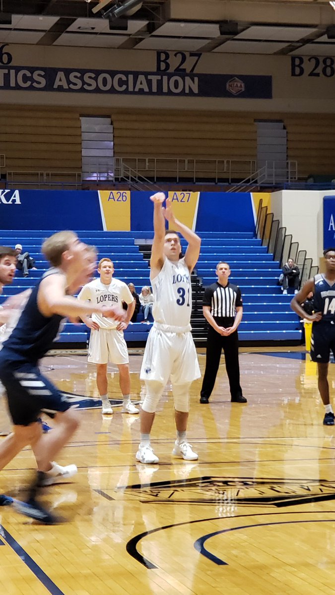 KHS_BoysBBall's tweet photo. Former Bearcat Jaden Engen sinking a few FTs for UNK as they beat Washburn! #hometown https://t.co/T2btL5vDg0