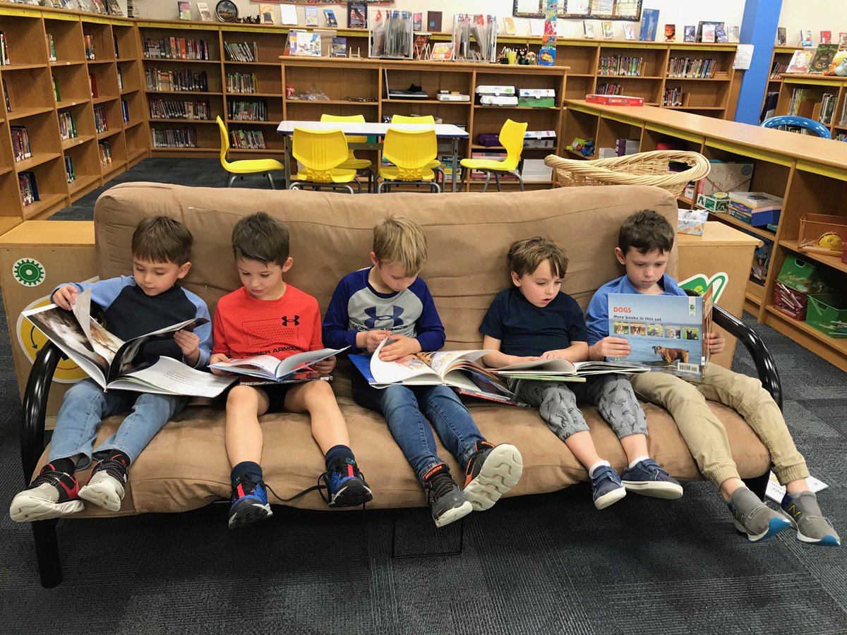 Mrs. Farmers students ⁦<a href="/FESfalcons/">Florence Elementary</a>⁩ reading their books after their weekly lesson and checkout!!! Nice to see them enjoying their books. Good job, boys!!! #FESfalcons #CelebrateKISD