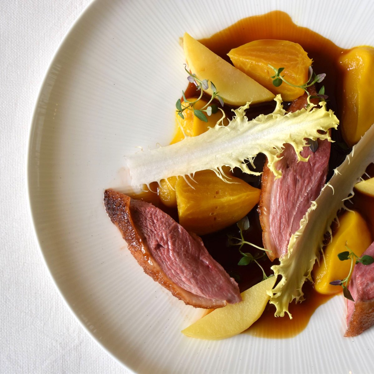 Treat your taste buds to an invigorating burst of flavor with every bite. bit.ly/364aaH2

🍽️: Dry Aged Duck - quince, golden beet, chicory.