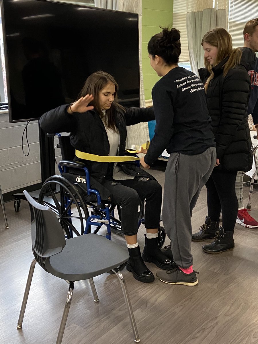 SDEmedhealth's tweet photo. Another great skills lab! Thank you, Heather, for coming in to engage and inspire our students. They learned how to transfer patients from wheelchairs to chairs! #engage #inspire @launch_sde @launch_tosa @BEHS_SDE @BCHS_SDE https://t.co/KHAFtKXvHb