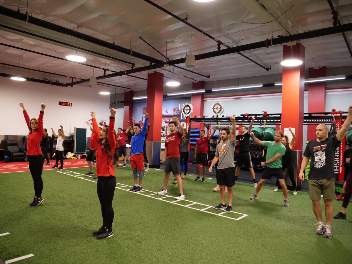 49ersFit's tweet photo. We had a great time yesterday hosting @AROD and the Stanford GSB Class! Gold Rush started them off with a fun Gold Rush Groove Dance Class and then Coach Jeff and Coach Candice put them through a Training Camp! Thank you for stopping by and Training Like A Pro! #49ersfit @49ers https://t.co/DAKivPaXQG