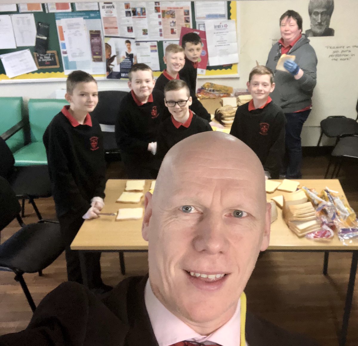 BigmacTheKing's tweet photo. P7 boys preparing sandwiches for St Patrick’s Soup Kitchen. Thanks once again to our sponsor Charlie Mc Glinchey #premierstores #homeless @HolyCrossBoys https://t.co/XQlWAIzGx4