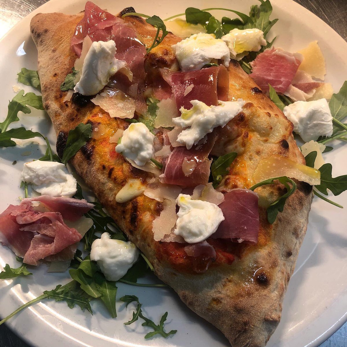 SalernoOundle's tweet photo. 🍕Calzone 🍕
.
This is our Primavera pizza as a calzone! Tomato, mozzarella, rocket, Parma ham, buffalo mozzarella and Parmesan! 
.
.
#pizza #calzone #oundle https://t.co/P7hUWNqkMp