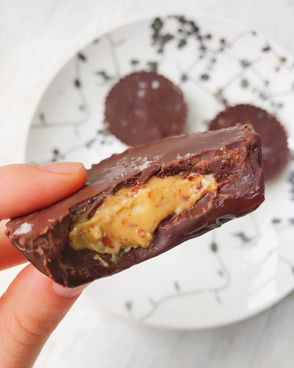 OmbarChocolate's tweet photo. Nom nom nom!!! Bagsy all three of these Ombar coated, peanut butter stuffed, peanut butter cups (try saying that 10 times in a row) 📸 @georgieeatsuk (IG) #peanutbuttercups #nutbuttercups #vegan #veganuary #veganuary2020 #ombar https://t.co/9E251JNuRg