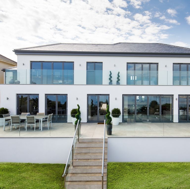 Savills's tweet photo. "A newly-refurbished 'eco' property, overlooking the glistening sea in St. Brelade, Jersey is up for sale." Read more at @HB: https://t.co/FdDwCORfDT https://t.co/193qLTu6YN