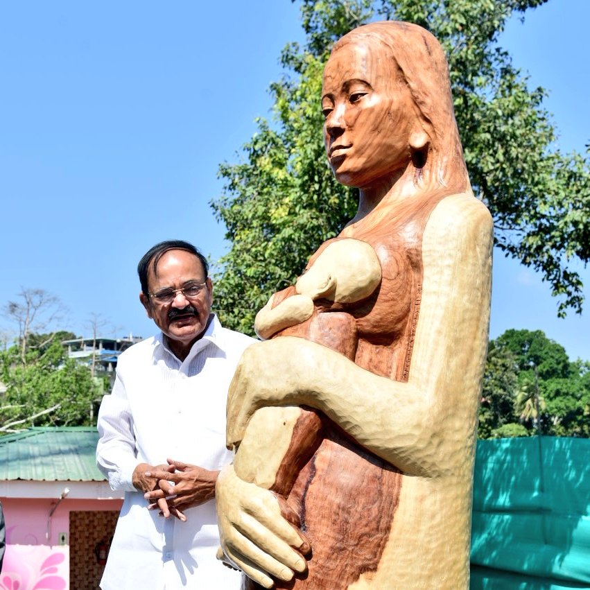 VPIndia's tweet photo. Had an opportunity to appreciate a wooden #sculpture of a mother &amp; child, made out of the trunk of a single #Andaman Padauk tree. 

The sculpture represents #nature as a mother who lovingly nurtures all her creation. #Art https://t.co/hnN56ckIRg