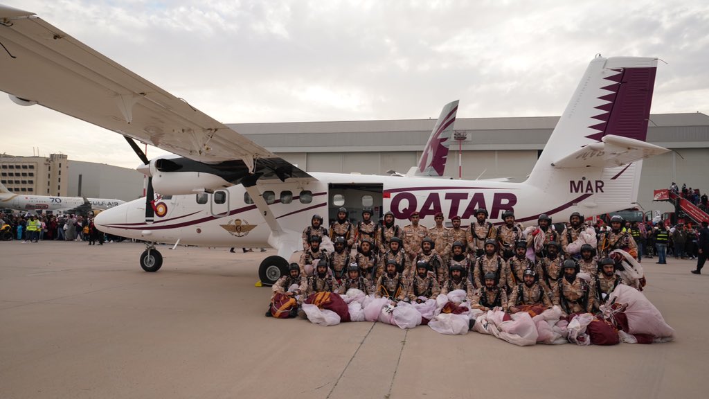 qatarairways's tweet photo. Look up into the skies as the @Qatar_AirSports team dazzles #KAS2020 attendees with their aerobatic performance.
#KuwaitAviationShow https://t.co/v04GOQQZ2e