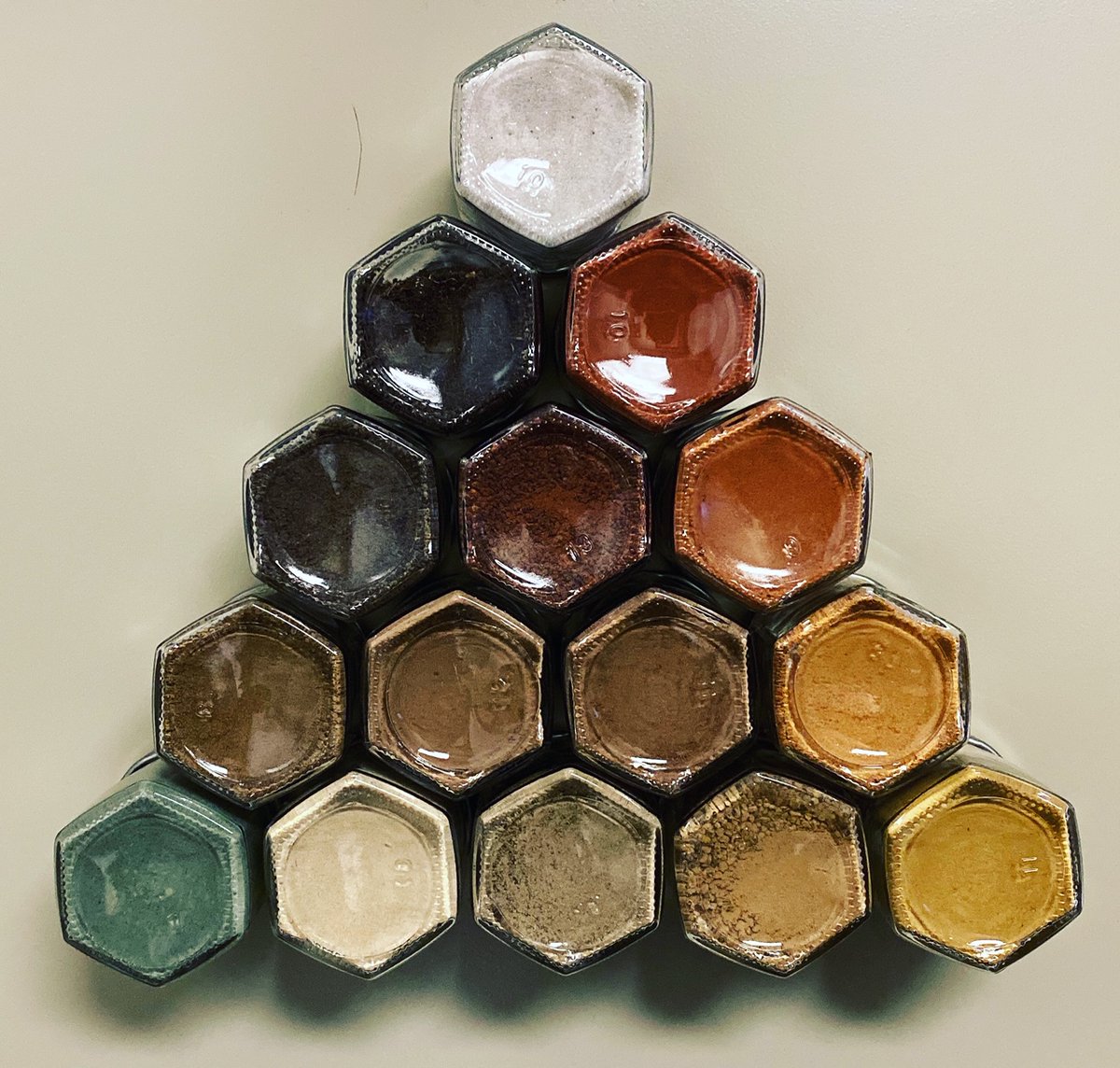 vaughan_soil's tweet photo. Magnetic spice jars filled with soil samples from past (& current) research projects - does that count?
It certainly adds some color to the side of my file cabinet as you enter my office. #soilart #soilcolor #sciart https://t.co/aWKSXRWiXl