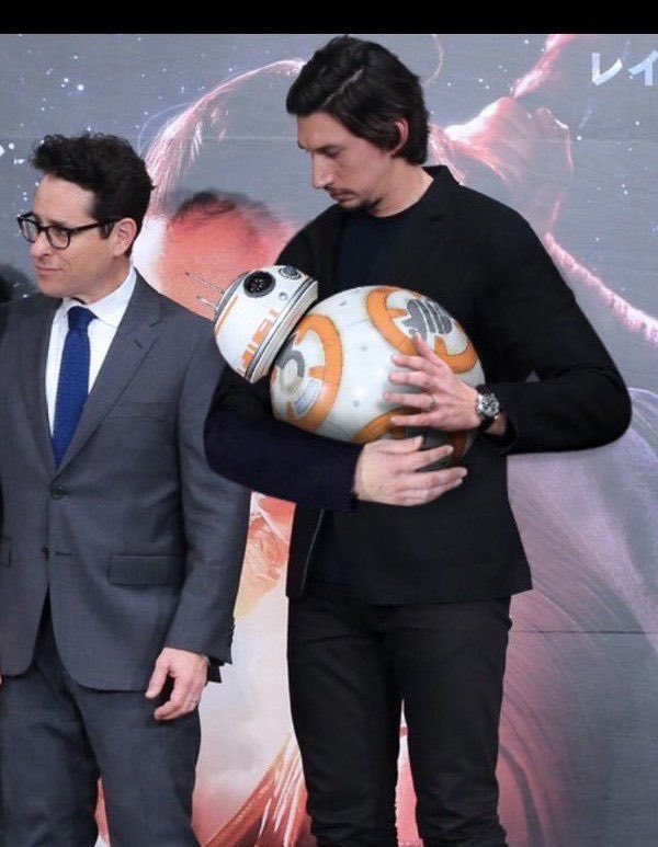 Ben Solo in his good boy sweater holding his adopted son, I love you