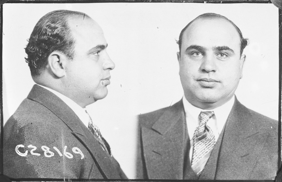 Al Capone's mugshot showing his right profile and the front of his face, Chicago, c. 1931. 