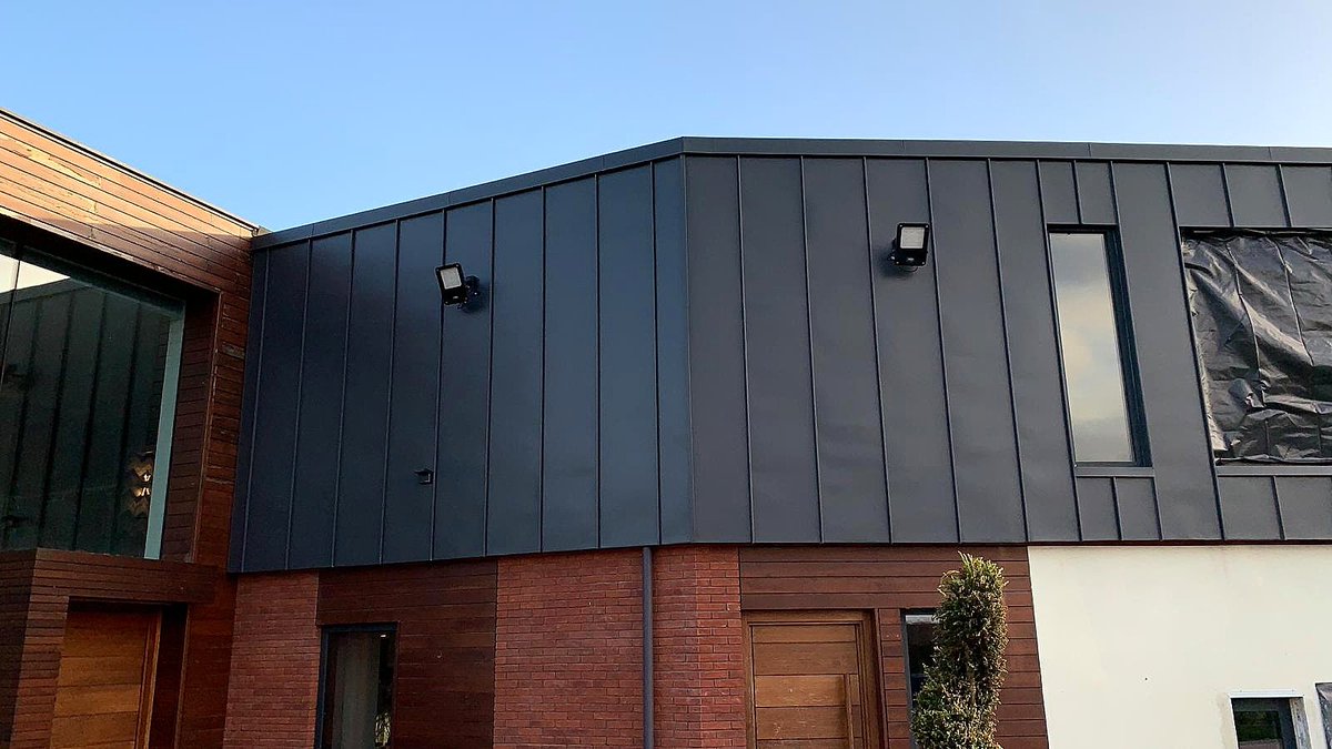RacRoofandClad's tweet image. Pleased to share a photo of this job in Derbyshire, using Greencoat PLX cladding. Love the contrast between the dark grey and red brick. @metal_solutions 
#greencoatplx #metalsolutions #cladding #roofing #swedishsteel #construction