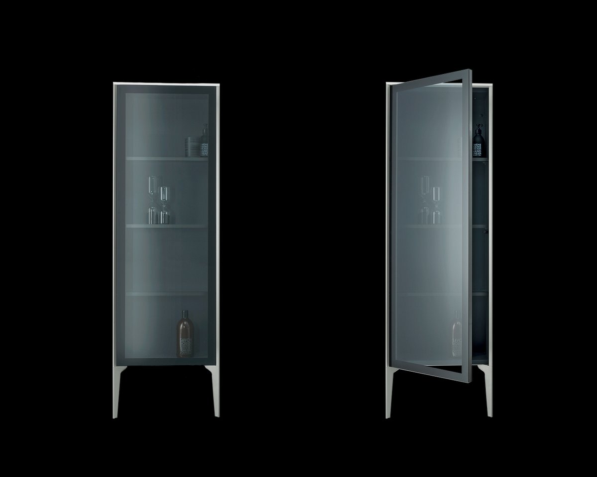 Duravit's tweet photo. Create a smoke screen! The XViu semi-tall cabinet features a smoked semi-transparent glass door, creating stylish privacy for your favorite bathroom accessories. Read more about XViu by #siegerdesign here: https://t.co/GEXc5PoJMV https://t.co/X8HHRD9u5u