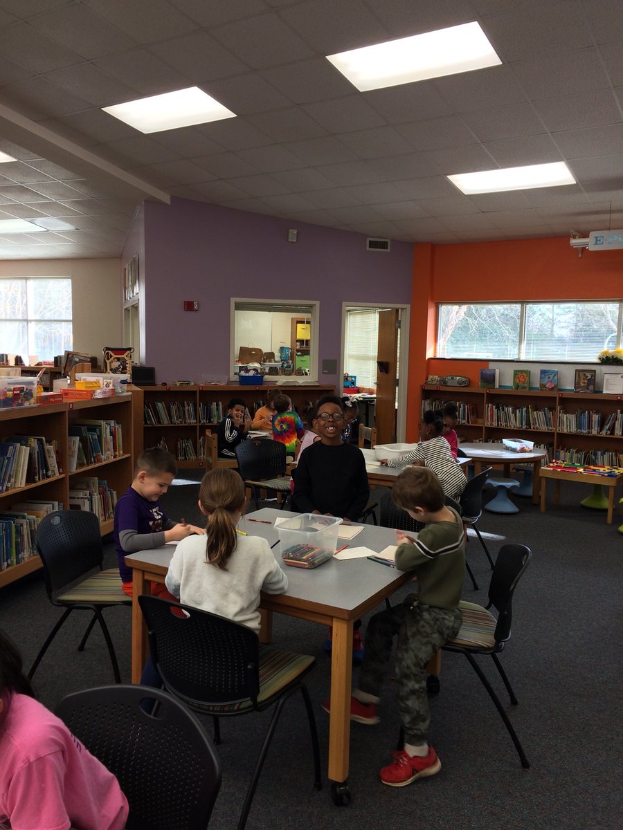 Working on our books about Jan Brett while we listen to music.