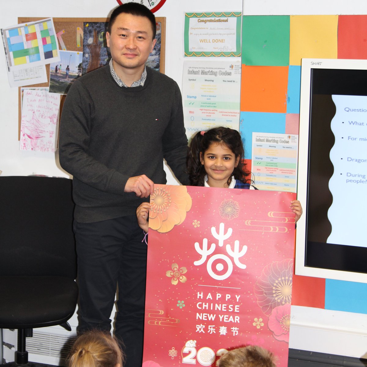 BGSBristol's tweet photo. Thank you to #BGSInfants parent Mr Hu for giving a wonderful talk to Year 2 on Chinese Festivals today, and to @cntolondon for the posters and brilliant folders full of activities the children received. #Infants #TopicWork #China https://t.co/7lLz0tfXDq
