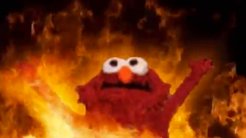 Elmo embracing fire