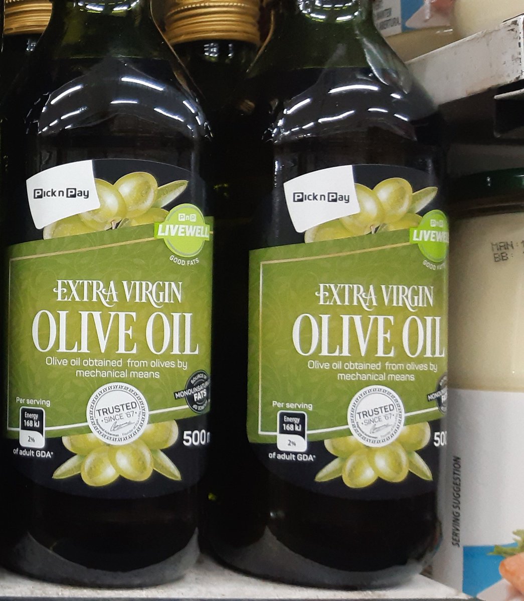 Quality extra virgin olive oil has a luminous green/yellow colour. The colour will differ (like wine) but there will always be a slightly green/luminous colour. It is ALWAYS sold in dark bottles, like red wine, light destroys it's nutrients and flavour.
